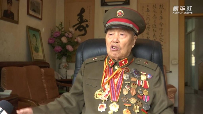 　　王占山，1929年生，河北丰南人。1952年参加抗美援朝战争，任中国人民志愿军第54军135师404团3营7连排长。